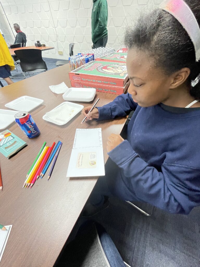 Legacy of Literacy provided each child with a sketchbook and colored pencils to begin creating their own story.