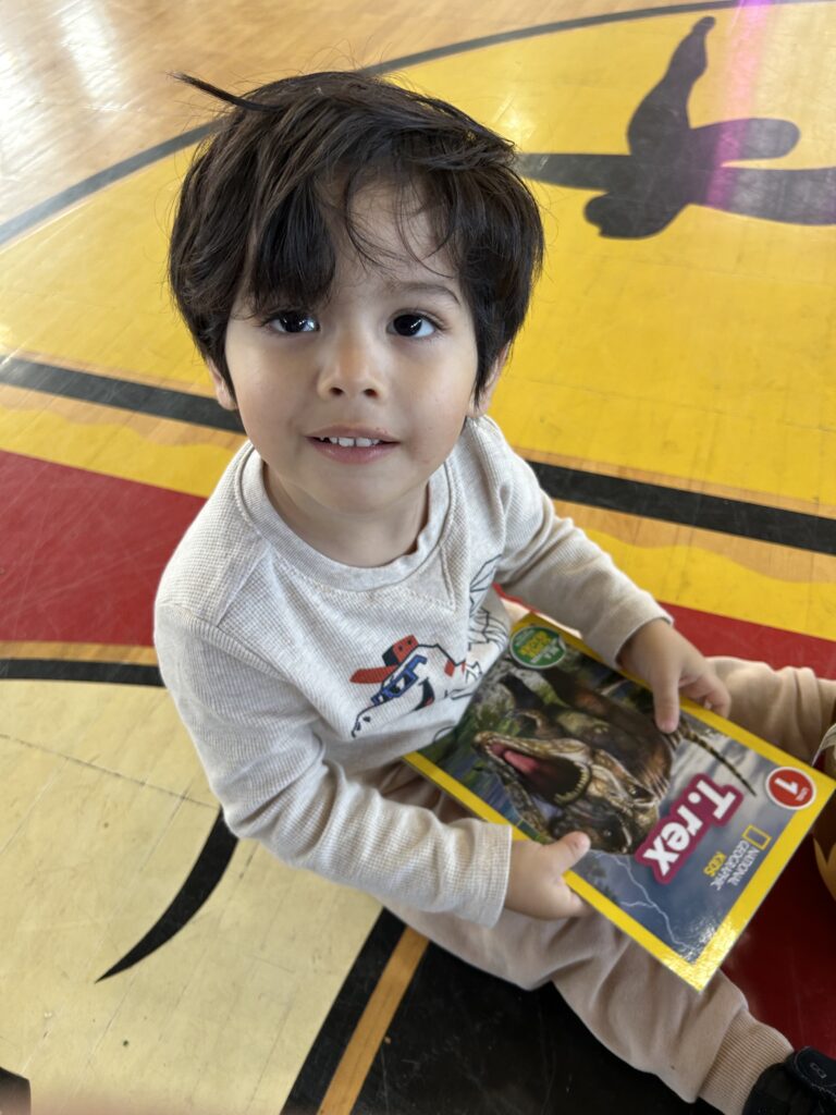 Each child left with at least 2 books to build their home library.